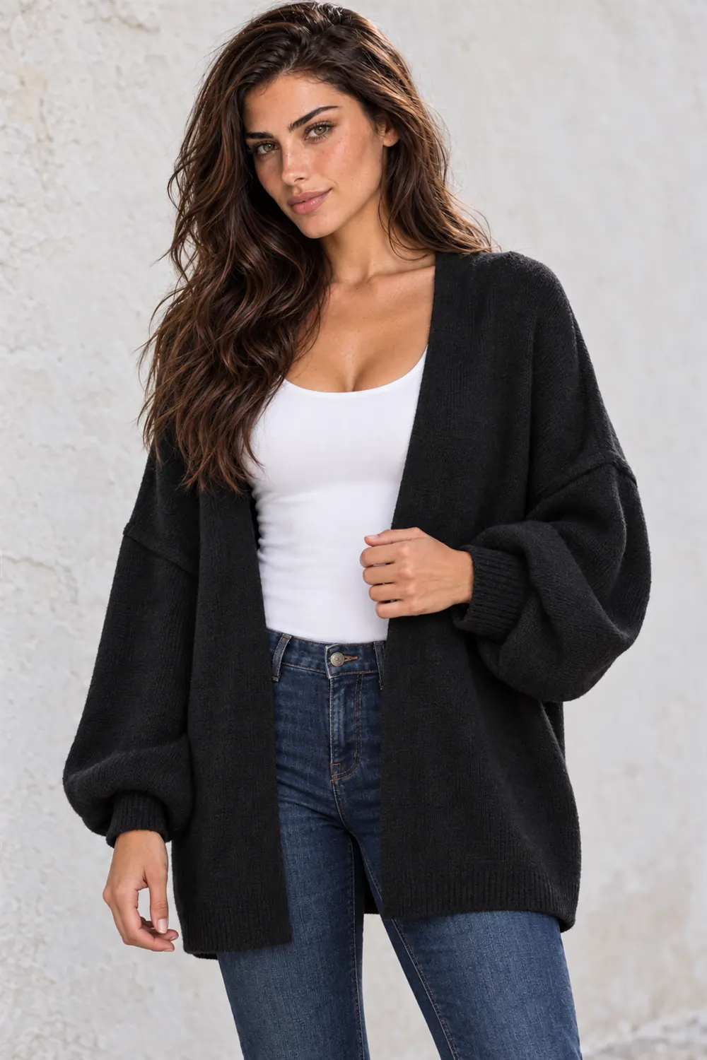 Detail of the ATHMILE cardigan's shoulder and sleeve