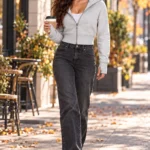 Cropped Zip-Up Hoodie Review: Trendy Queen With Thumbholes Woman wearing the Trendy Queen cropped grey zip hoodie on a coffee walk